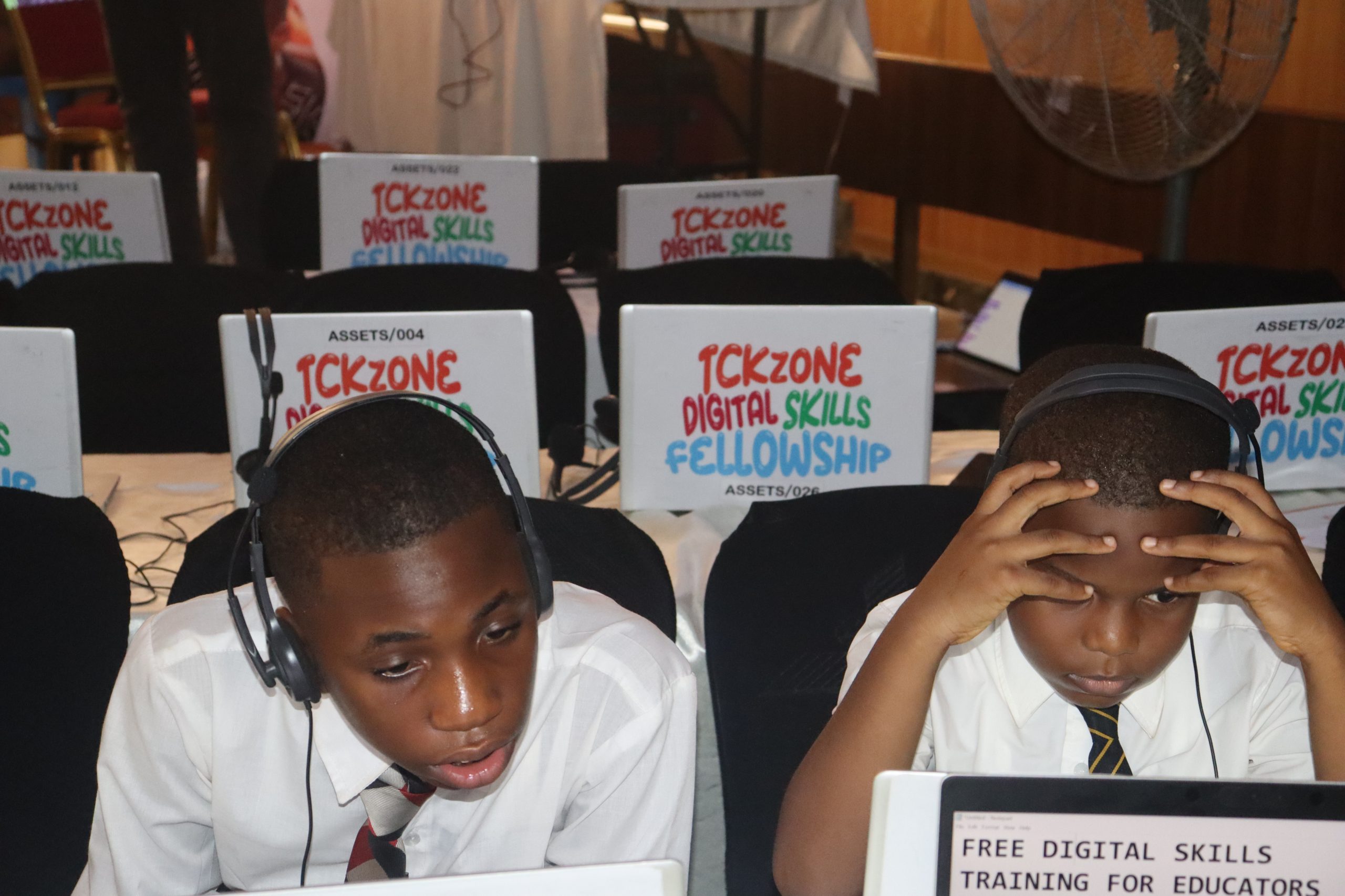 tckzone students concentrating on laptop
